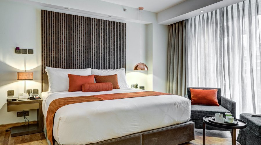 Deluxe King Room complete with 42" SMART LED TV, Rain Shower, USB Charger, Blue Tooth Device, Sa