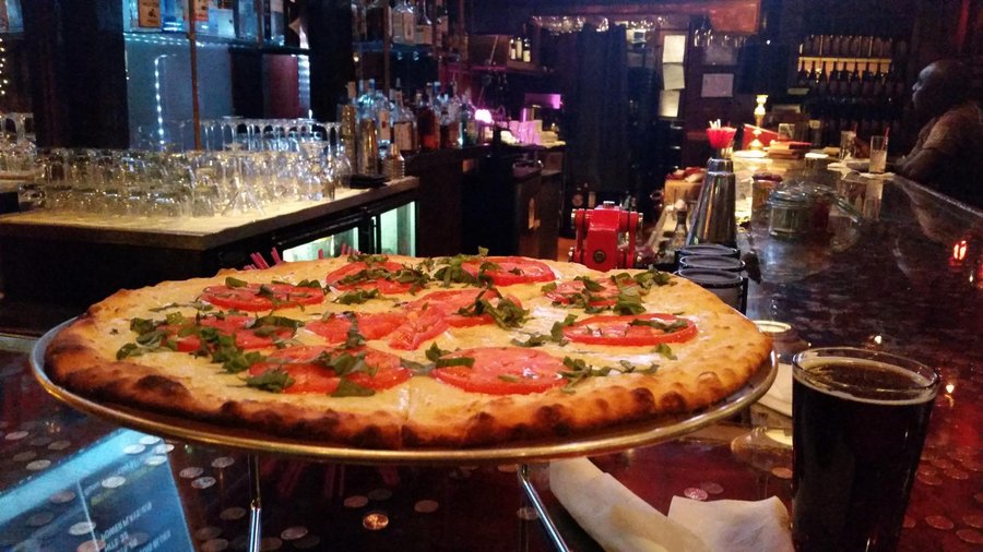 This is the margarita pizza while on the bar of the adjoining restaurant.