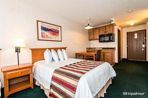 3 Peaks Lodge in Keystone, image may contain: Furniture, Indoors, Bed, Bedroom