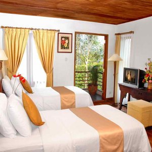 Sari Ater Hot Springs Ciater in Bandung, image may contain: Furniture, Bed, Bedroom, Indoors