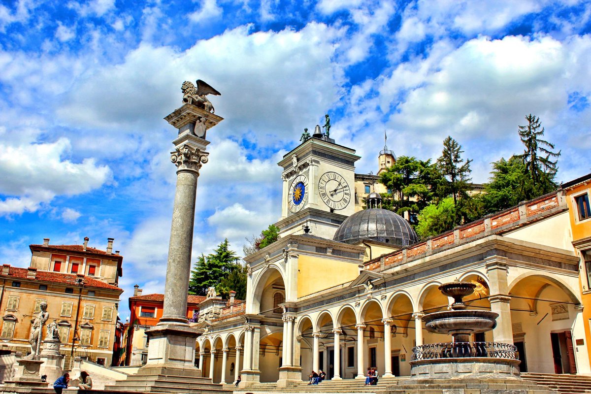 Clock tower and castle in Piazza Liberta, Udine, Friuli Venezia-Giulia,  Italy Stock Photo - Alamy