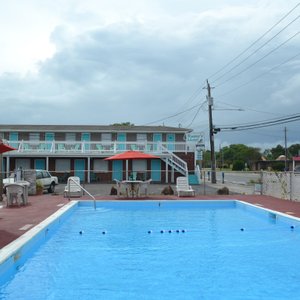 After a day on the beach, relax by the pool