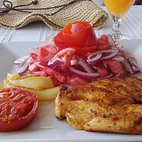 grilled chicken and chips and salad