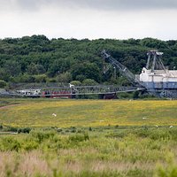 Looking North over the marshes with walking dragline in the distance