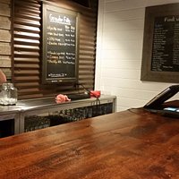 Inside the brewery's tap room. Friendly staff fill growlers with your choice of beer.