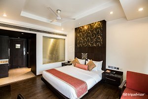 Hotel Godwin Deluxe in New Delhi, image may contain: Ceiling Fan, Electrical Device, Device, Appliance