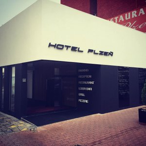 Hotel Plzen in Pilsen, image may contain: Dining Table, Table, Dining Room, Interior Design