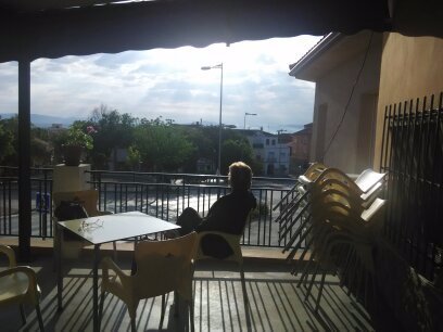 Grabbing some early sun outside restaurant