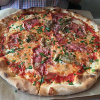 Mushrooms and ham pizza