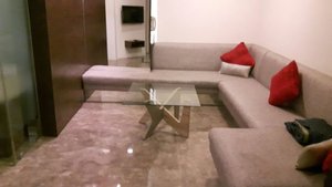 Maya Hotel in Chandigarh, image may contain: Couch, Table, Floor, Coffee Table