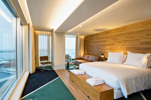 Octant Hotels Ponta Delgada in São Miguel, image may contain: Interior Design, Penthouse, Wood, Hotel
