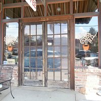 Entrance to the shop with patio seating