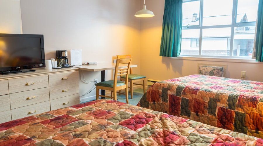 Standard Two-Bed Room. Comes with coffee maker, fridge, HD TV +cable, microwave, and more!