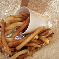 There is a sandwich at the bottom of that mess