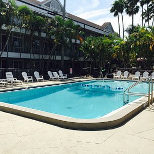 Lantern Inn & Suites in Sarasota, image may contain: Hotel, Resort, Pool, Chair