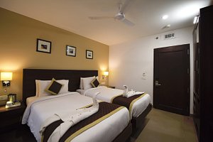 Hotel Gandharva - A Green Hotel in Jaipur, image may contain: Ceiling Fan, Bed, Furniture, Bedroom