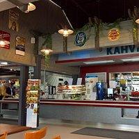 The cafe is next to the museum shop and the Mobilia car museum.