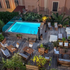 Palm Gallery Hotel in Rome, image may contain: Pool, Water, Swimming Pool, Outdoors
