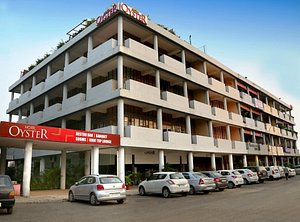 Hotel Oyster in Chandigarh, image may contain: City, Urban, High Rise, Apartment Building