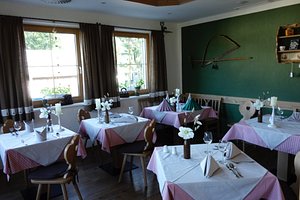 Hotel Zum Urviech in Ehrwald, image may contain: Dining Room, Dining Table, Table, Restaurant