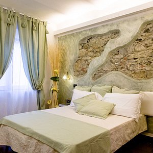 Hotel Marina in Monterosso al Mare, image may contain: Home Decor, Bed, Furniture, Bedroom
