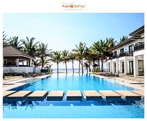 Puerto Del Sol Beach Resort in Luzon, image may contain: Hotel, Resort, Villa, Pool