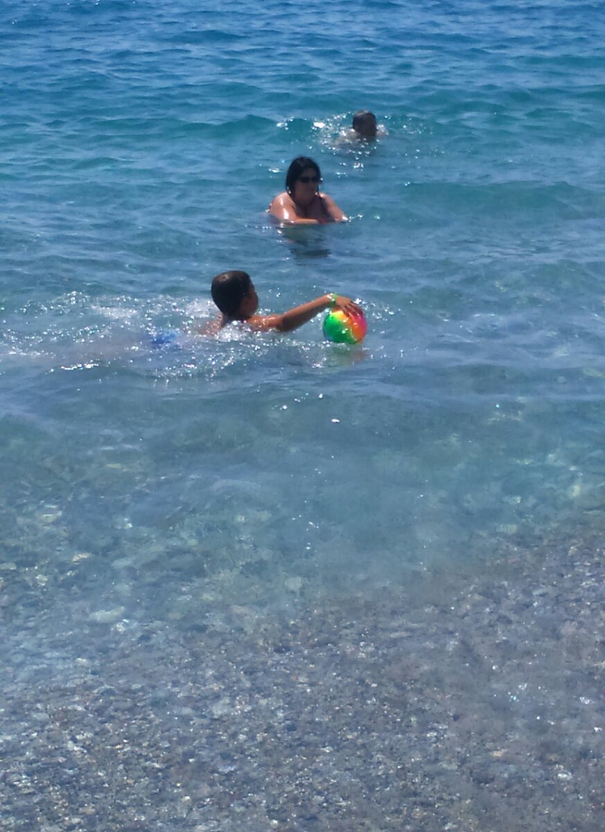 Crystal Clear Water of Mediterranean Sea on Afandou Beach on
