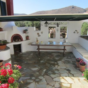 The communal seating and barbeque area outside our front door