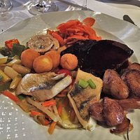 Mix of food on the one plate.