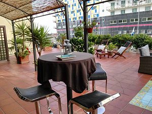 B&B Mini Hotel Incity in Salerno, image may contain: Potted Plant, Plant, Chair, Table