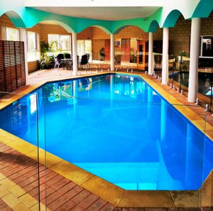 Relax in the spacious indoor pool and spa area