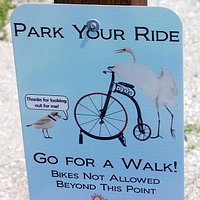 a sign on the trail