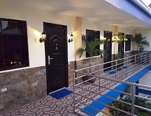 Mango's Beachfront Resort in Luzon, image may contain: Hotel, Handrail, Resort, Plant