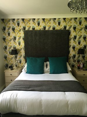 Broadmead Boutique B&B in Tenby, image may contain: Cushion, Home Decor, Interior Design, Bed