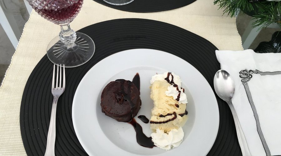 Chocolate lava cake and ice cream with whip cream