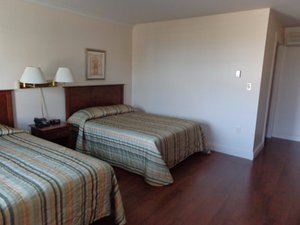 Red Cap Motel in Pubnico, image may contain: Bed, Furniture, Lamp, Table Lamp