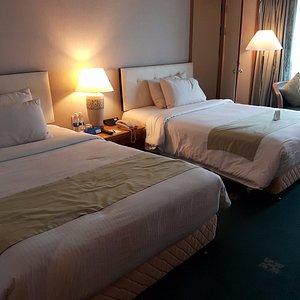 Link room with 2 queen beds.