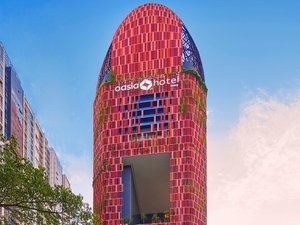 Oasia Hotel Downtown, Singapore By Far East Hospitality in Singapore, image may contain: City, Urban, High Rise, Condo