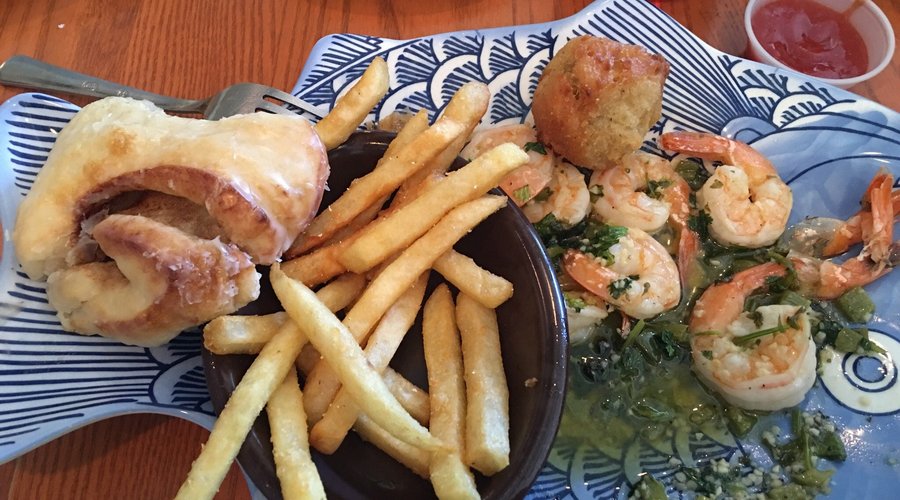 Cilantro butter shrimp with French fries.