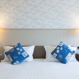 The Golden Sands in Jersey, image may contain: Cushion, Home Decor, Pillow, Furniture
