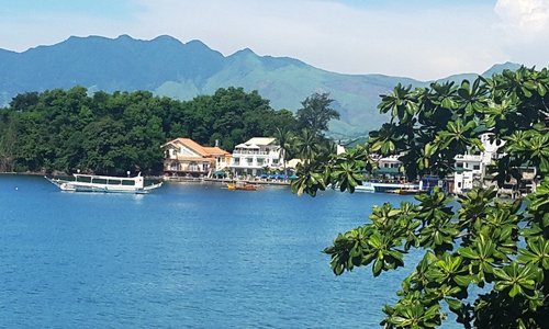 View looking at Subiza nestled in the corner of the bay from Palm Tree Resort balcony