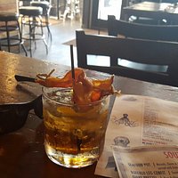 To kill a ladybird cocktail. Root beer Bourbon and candied bacon! Can't go wrong