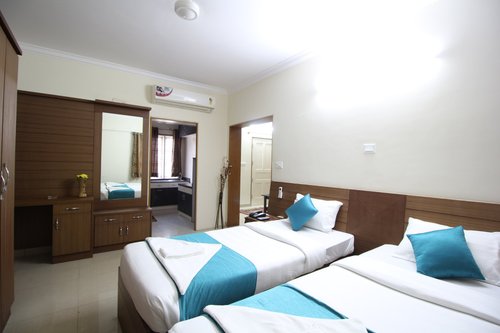 WHITE FEATHER HOTEL (Bengaluru) - Apartment Reviews, Photos, Rate ...