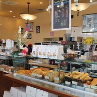 Baked goods, sandwiches, and other tasty items in spotless surroundings.