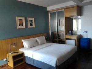 QuaySide Hotel in Melaka, image may contain: Bed, Furniture, Bedroom, Dorm Room