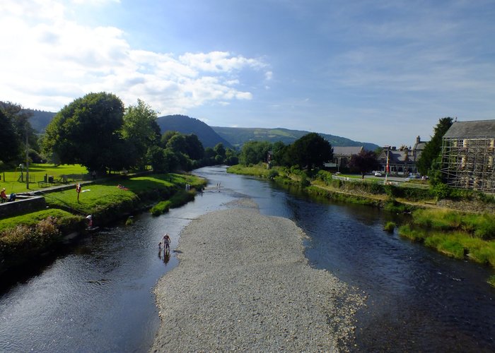 View from half way along the bridge .