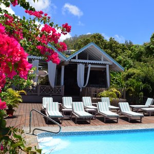 Beachcombers Hotel in St. Vincent, image may contain: Villa, Resort, Hotel, Chair