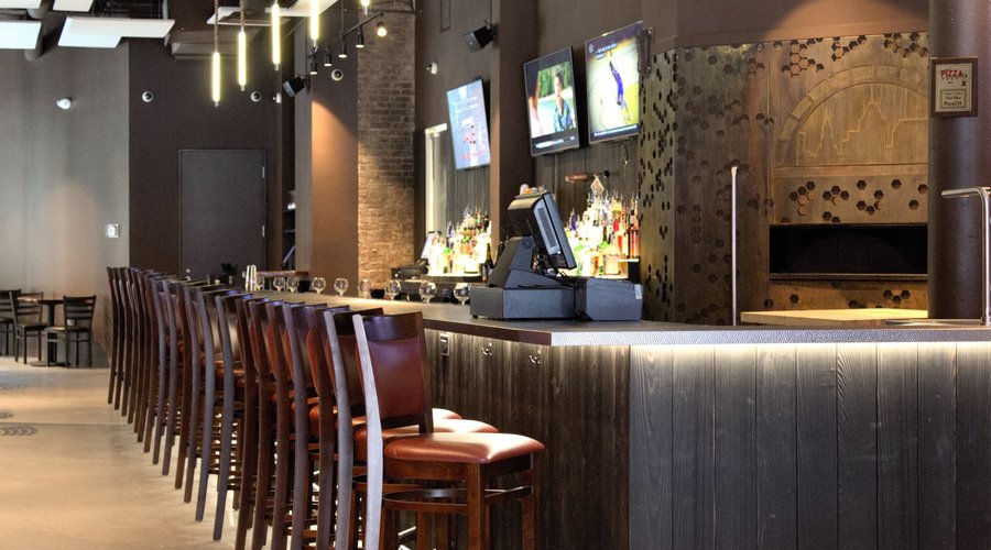 The bar and amazing brick oven