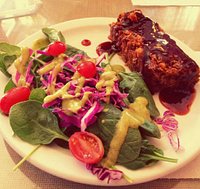 Chickpea and pecan loaf with a side salad.