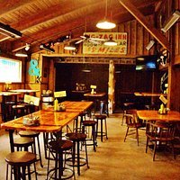 lots of tables in the side area of the bar section